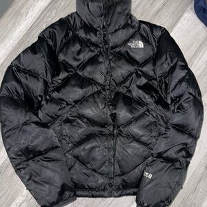 Black women North Face puffer jacket